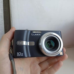Panasonic Lumix DMC-TZ1 Black 5.0MP digital compact camera WORKing FULL SET