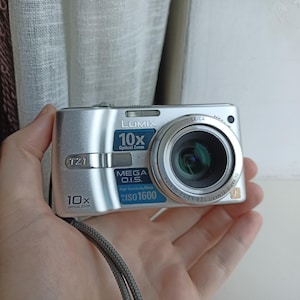 Panasonic Lumix DMC-TZ1 Silver 5.0MP digital compact camera WORKing FULL SET