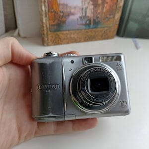 Canon Powershot A1100 Silver 12.1MP digital compact camera WORKing FULL SET