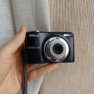 Nikon Coolpix L25 Black 10.1MP fotocamera digitale compatta funzionante set completo