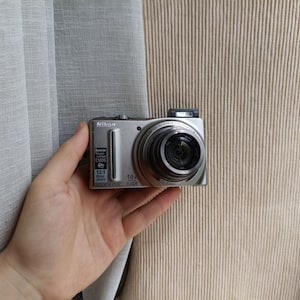 Nikon Coolpix S9100 Silber 12,1 MP Digitalkamera, funktionsfähig, Komplettset
