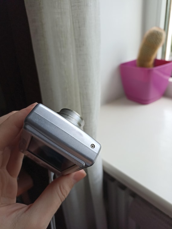 Buy Nikon Coolpix L12 Silver 7.0MP Digital Compact Camera Working