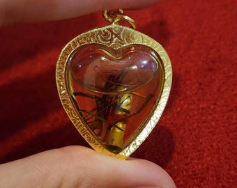 Poderoso colgante de aceite de atracción amorosa Bulu Perindu, con marco de micras de oro, bendecido por su encanto, atracción, amor, respeto y popularidad.