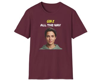 May include: Burgundy t-shirt with a portrait of a person wearing a green hoodie. The text "GEN Z ALL THE WAY" is printed above the portrait in yellow and white.