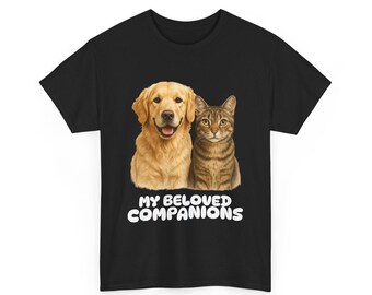 May include: Black t-shirt featuring a golden retriever and a tabby cat side-by-side. The text "MY BELOVED COMPANIONS" is printed in white below the images. The dog is smiling, and the cat is looking forward.