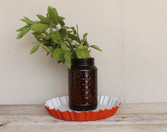 Vintage oranjekleurige vlaaivorm