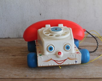 Vintage 1961 Fisher Price Chatter Teléfono Tirar Juguete
