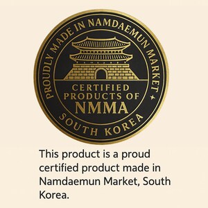 May include: A circular black and gold seal with the text "Proudly Made in Namdaemun Market, South Korea." The seal features a traditional Korean building and the text "Certified Products of NMMA."