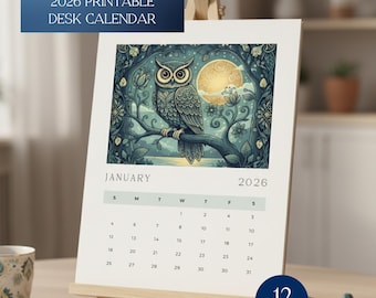 May include: A 2026 printable desk calendar displayed on a small wooden easel. The calendar features an illustration of an owl perched on a branch under a full moon. The text "2026 PRINTABLE DESK CALENDAR" is at the top.
