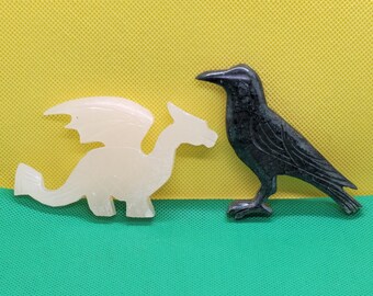 home decor  white calcite dragon  63.59 G & black jasper crow 34.63 G