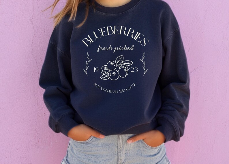 Printed on a soft-washed Comfort Colors 1566 crewneck, this sweatshirt has that lived-in feel right from the first wear. With its relaxed fit and pigment-dyed fabric, it pairs perfectly with your favorite denim, leggings, or cutoff shorts for a cozy-cute summer loo