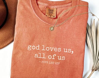 Pope Leo XIV Comfort Colors® Shirt – God Loves Us All Quote Tee – Catholic Faith T-Shirt – New Pope 2025 Gift – Religious Christian Shirt