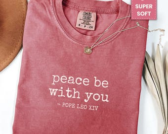 Pope Leo XIV Quote Shirt – Peace Be With You Tee –  Catholic Faith Comfort Colors® Shirt – Christian Gift – Robert Prevost Inspired T-Shirt