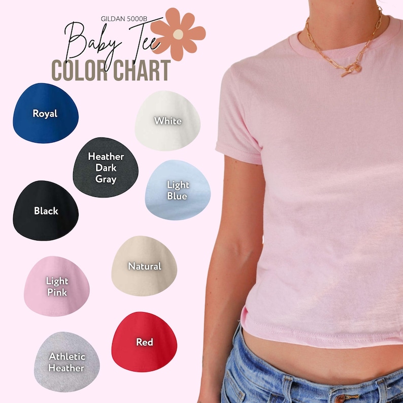 May include: A light pink baby tee shirt with a color chart showing various shirt colors, including royal blue, white, black, heather dark gray, light blue, light pink, natural, athletic heather, and red. The text "Baby Tee Color Chart" is displayed.