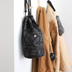 Mini Wholecloth Logan Bag in cotton/linen print. Drawstring backpack. Bucket Bag. Bag Making. Benetton bag.