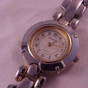 Persona Women&#39;s Quartz Wrist Watch: Silver & Gold Stainless Steel Band