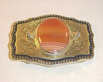 Gold and Black Belt Buckle With Polished Gemstone