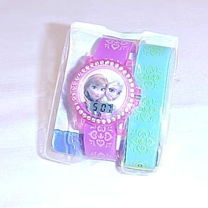Disney Frozen LCD Watch With Spare Band in Working Condition With Instructions