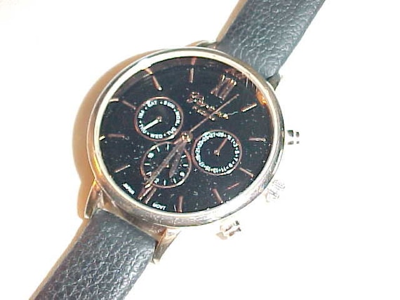 Men s Geneva Platinum Quartz Watch With Black Face and Black Simulated Leather Band Working Condition Etsy