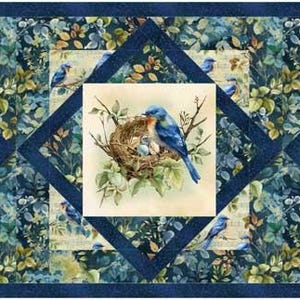 May include: A rectangular fabric table runner featuring a repeating pattern of blue birds and nests. The design includes three central square panels framed by dark blue borders, set against a background of green leaves and foliage.