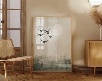 May include: A framed print of a minimalist landscape with a white circle and a flock of black birds flying in formation against a light gray background.
