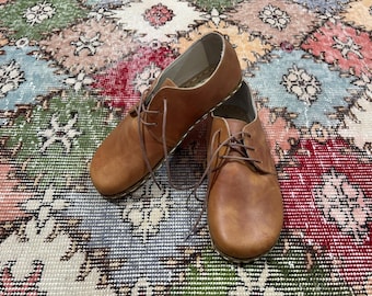 Chaussures pieds nus en cuir faites main : bout large, zéro chute