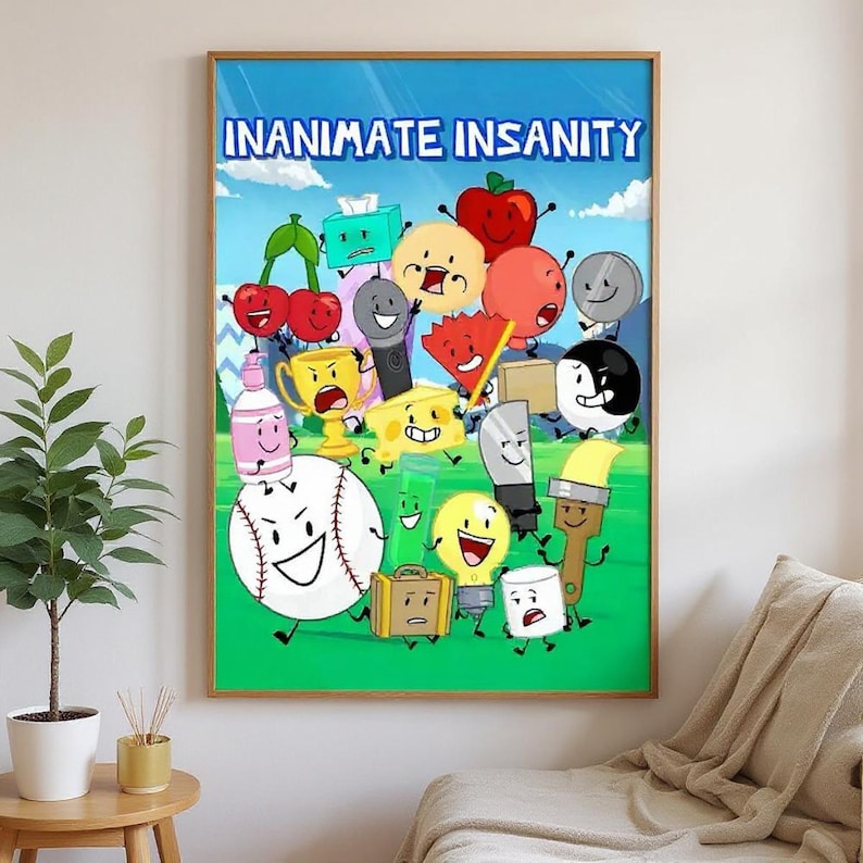 May include: A framed poster featuring cartoon characters from "Inanimate Insanity" against a blue sky and green grass background. The characters are various anthropomorphic objects, including a baseball, a trophy, and a lightbulb. The title "INANIMATE INSANITY" is displayed at the top.
