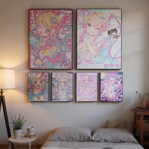 May include: A collection of framed anime art prints featuring colorful illustrations of anime characters. The artwork showcases a pastel color palette with pink, blue, and yellow hues. The prints are displayed on a white wall above a bed.