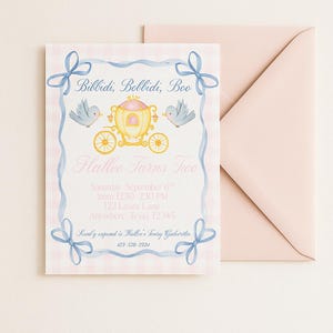 May include: A pink and blue invitation with the text "Bibbidi, Bobbidi, Boo" and "Hallee Turns Two." The invitation features a gold carriage, blue birds, and blue ribbon accents. A pink envelope is visible.