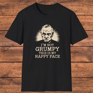 面白い皮肉Tシャツ「私は不機嫌じゃない、これが私の幸せな顔」、男性と女性のためのユーモアグラフィックシャツ、皮肉好きへのユニークなギフト