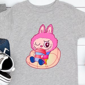 Labubu Shirt – Cute Cartoon T-Shirt – Aesthetic Kawaii Tee – Gift for Her – Soft Graphic Tee – Trendy Cute Shirt -Pink Labubu Design