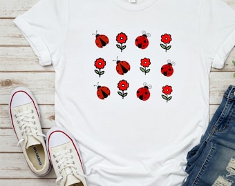 Maglietta con motivo a coccinella e fiore rosso / Maglietta floreale con insetto