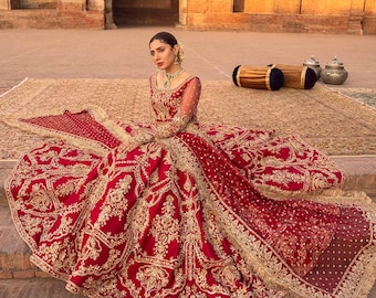 Regal Crimson Bridal Lehenga with Intricate Gold Embroidery  Asian bridal nikkah barat dress, Indian Woman Wedding Lehenga, dulhan lehenga
