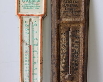 Two Vintage thermometers tin advertising Funeral Home & Donovan Farmers advertisement wall mount