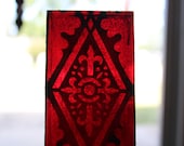 Two vintage Red painted stained glass panels small salvage sun catcher supplies
