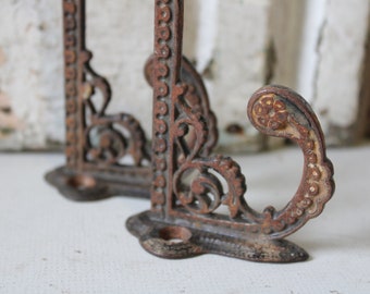 Two antique hooks cast iron hanger Ornate double hook coat hat rack Victorian salvage restoration Architectural hardware