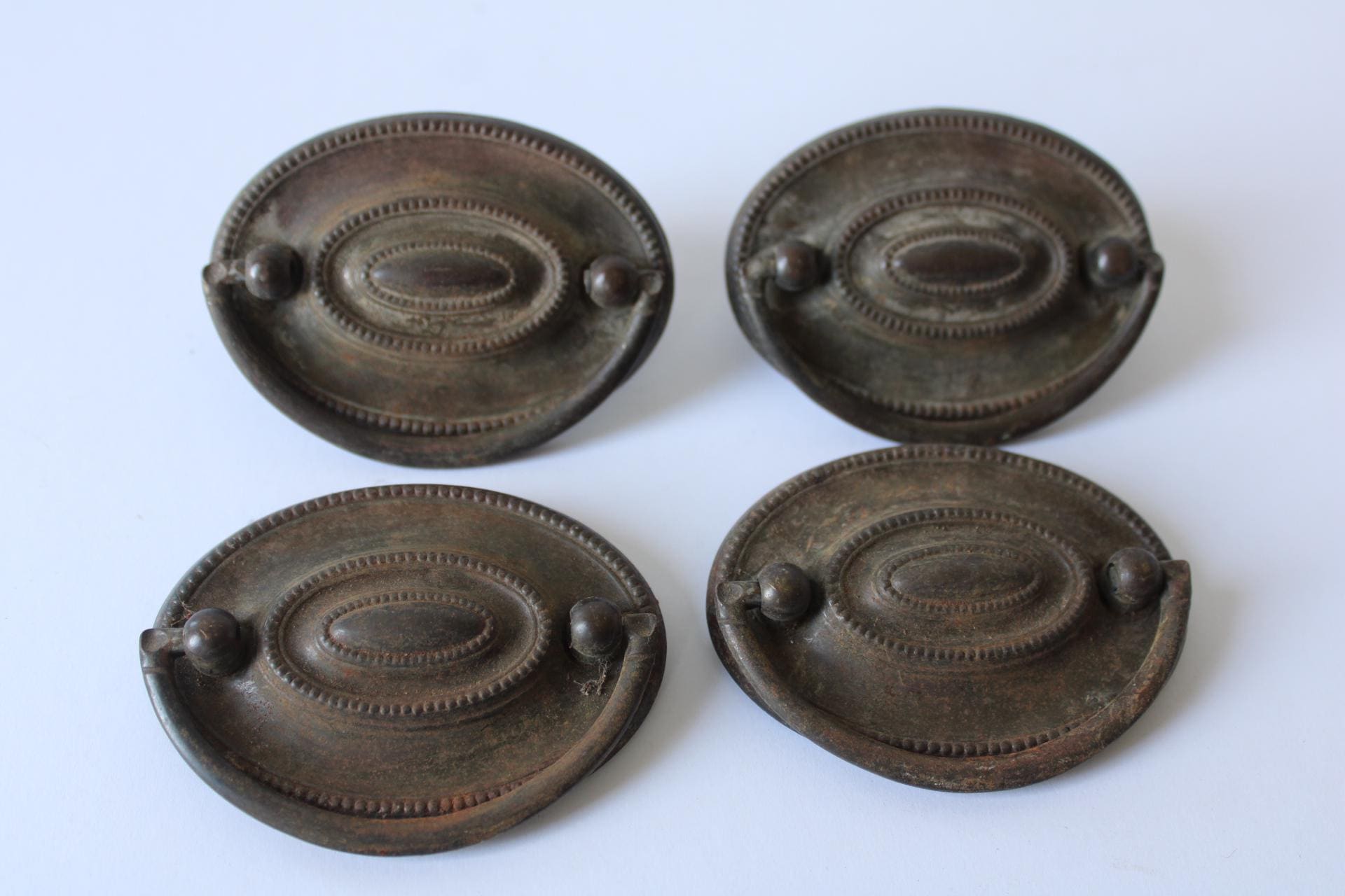 Lot of Four drawer handles antique oval pulls vintage architectural salvage Victorian restoration hardware supplies