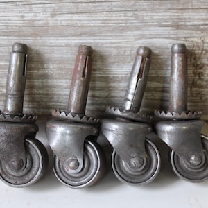 4 Vintage casters metal wheels feet Furniture aged restoration hardware salvage set of four