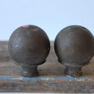Two antique round metal aged brass finials Architectural salvage embellishment furniture cap post top decorative supplies