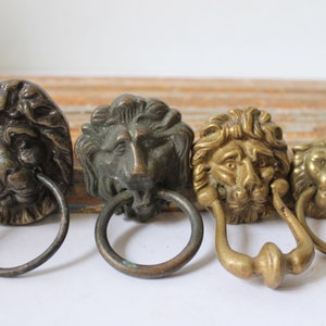 Four Vintage Lion w/ ring embellishment drawer pulls appliques cabinet hardware ornamental handle Old World furniture mount lot