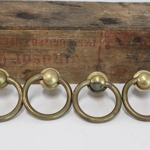 Four vintage brass ring pulls handles architectural salvage  restoration hardware supplies