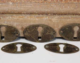 Lot 5 antique Keyhole plates Oval aged brass drawer cabinet skeleton key escutcheon hardware Restoration salvage
