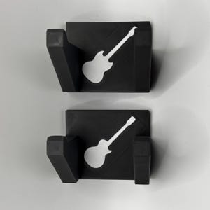 Colgador de guitarra CRKD RedOctane: soporte de pared para Guitar Hero y Rock Band
