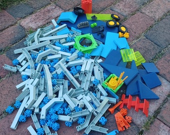 Vintage 80s Fisher Price Construx 289 construction building pieces - 1983 UV sensitive glow in the dark waterproof build toy collection