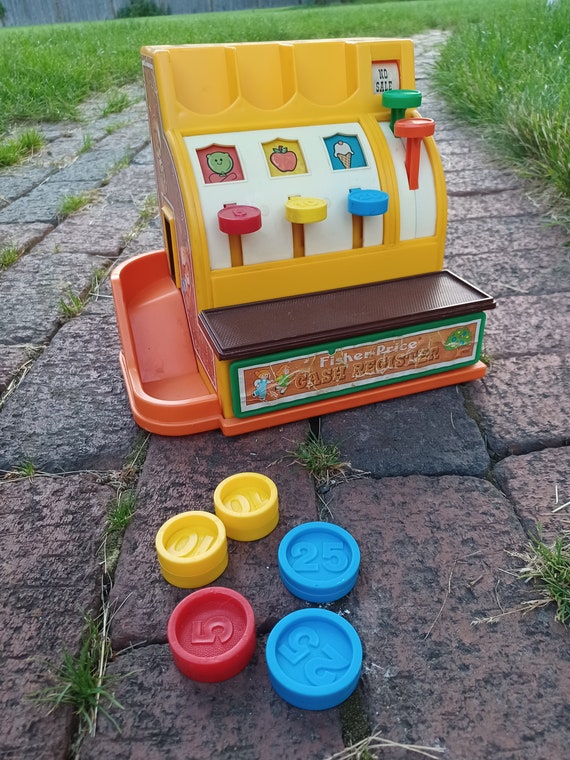 Caisse enregistreuse et pieces de monnaie de travail Fisher Price vintage des annees 70 1974 estampille date avec changement de tiroir et cloche accessoires de magasin de jeu semblant Etsy France