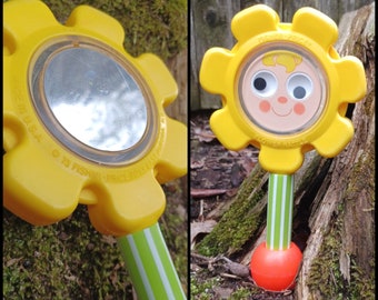 Vintage 70s Fisher Price googly eye happy flower mirror rattle - 1973, festival raver wand, silly chunky plastic baby learning toy