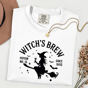 Witch on Broom T-Shirt – Halloween Silhouette Tee – Spooky Witch Shirt – Gothic Fall Gift Top