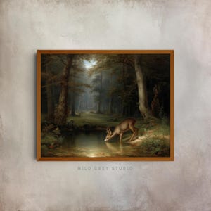 May include: A framed vintage painting depicts a deer drinking from a pond in a forest. The artwork features a brown deer, lush green trees, and a dark pond. The painting is set in a wooden frame and is signed "MILO GREY STUDIO".