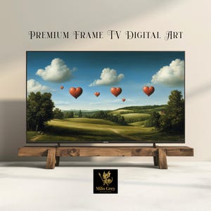 May include: A digital art print displayed on a flat-screen TV. The artwork depicts a landscape with heart-shaped balloons floating in a blue sky with clouds. The TV is on a wooden stand. Text at the top reads "PREMIUM FRAME TV DIGITAL ART".