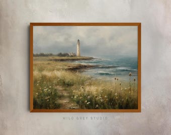 May include: A framed landscape painting of a lighthouse on a rocky coastline. The artwork features a beige lighthouse, a path through tall grass, and a blue ocean under a cloudy sky. The frame is a warm brown color. The text "MILO GREY STUDIO" is at the bottom.